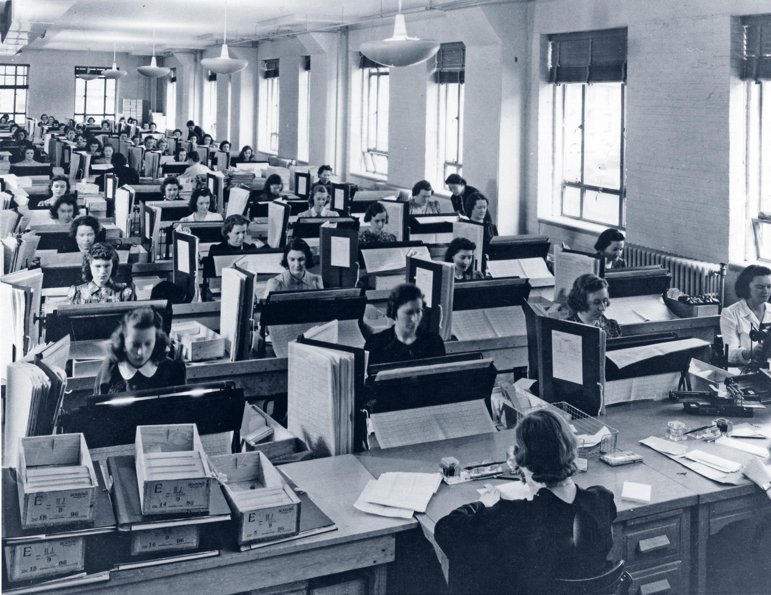 Rows of clerks working in the US Census Bureau tabulation room, circa 1940